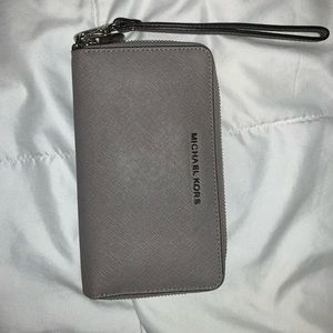 Gently used MK zipper wallet